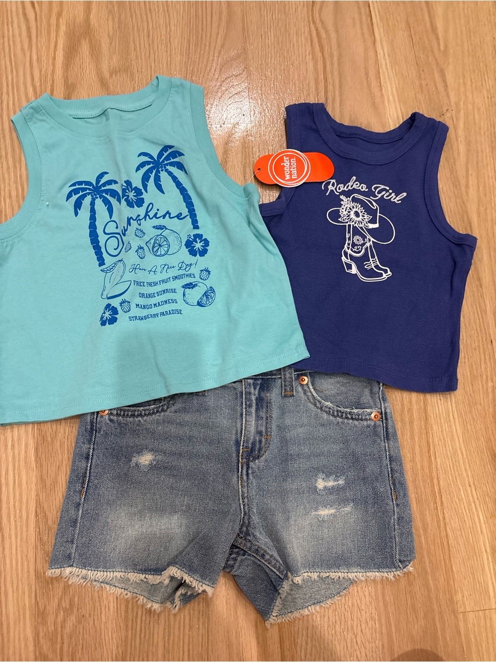 Girls Levi denim shorts and tops
